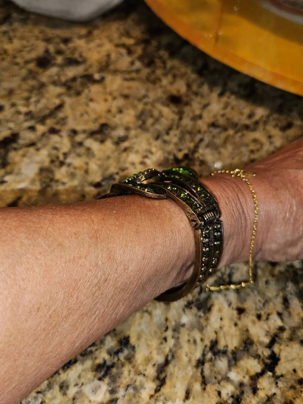Beautiful hinged, Emerald style watch with new battery. Worned once to Wicked.